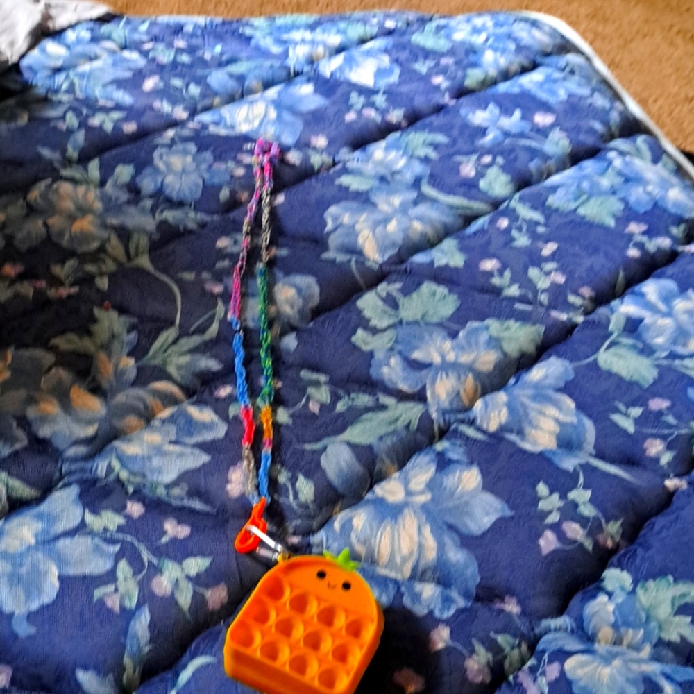 A pineapple bag with the keychain